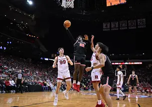 Dalen Davis drives for a layup in Princeton’s December 2024 win over Rutgers.