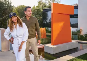 Kwanza Jones ’93 and José E. Feliciano ’94 at their $50 million mansion in the Pacific Palisades