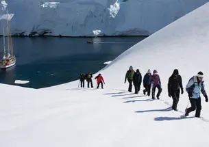 Members of the 60 South traveling party set foot in Antarctica after sailing the Ocean Tramp from Ushuaia, Argentina.