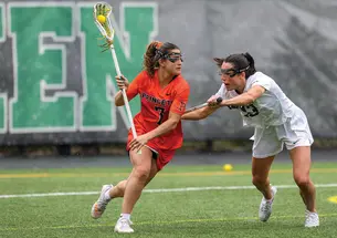 Haven Dora ’26 looks to pass in a 2025 game at Dartmouth. 