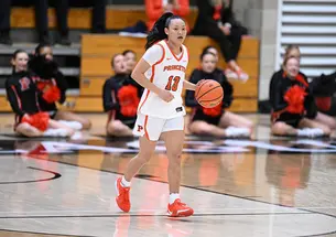 Ashley Chea dribbling up the court