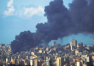 Smoke rises after an Israeli airstrike in early April hit a building in Beirut, several miles from Lebanese American University.