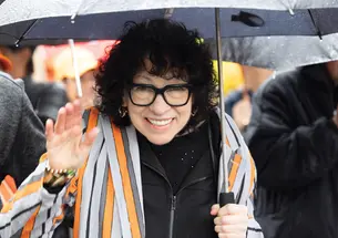 Supreme Court Justice Sonia Sotomayor smiling and waving to camera during the P-radee