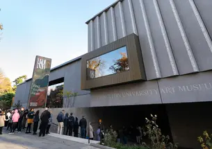 Line of people standing outside the Princeton University Art Museum waiting to get in