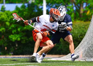 Nate Kabiri ’27 looks for an opening in Princeton’s NCAA quarterfinal win over Penn State.