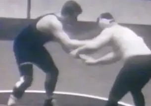 Chuck Dressel ’71, left, wrestling for Princeton against Penn in 1969.