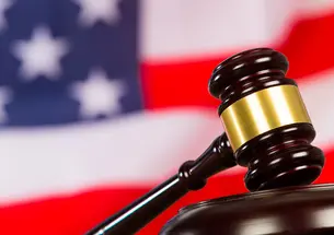 gavel resting in front of American flag