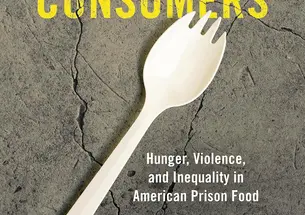A spork on cracked concrete with the title surrounding it