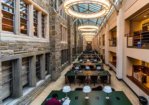 This is a photo of tables and lamps in Firestone Library.