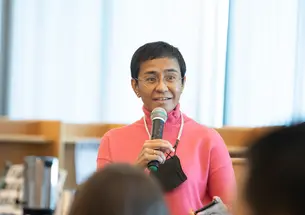 Maria Ressa speaking at Toms River North High in New Jersey in 2022. 