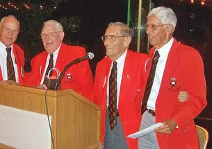 Class of '47 officers at their 60th reunion class dinner are, from left, Reunions chairman Bob Tritsch, president Jack Hughes, secretary Asa Bushnell, and treasurer Arvind "Koke" Kokatnur. Bushnell has returned to Princeton for three class reunions since