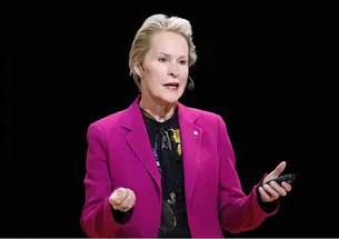 AITN_FrancesArnold.jpg This is a photo of Frances Arnold ’79 speaking at a podium.