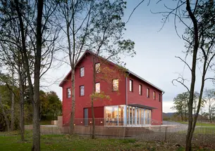 ARCHITECTURE RESEARCH OFFICE: A view of the Hudson River Center at Long Dock Park in Beacon, N.Y., created through the restoration of a 19th-century industrial barn. Architecture Research Office is pursuing LEED Gold certification for the project. (Photo: