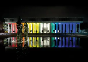 Robertson Hall at night during the “Every Voice” conference.