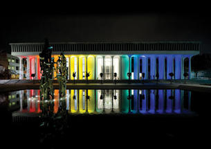 Robertson Hall at night during the “Every Voice” conference.