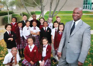 Former professional basketball player Brian Taylor ’84 inspires children at a charter school in Phoenix.