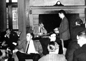 The caption for this 1962 Bric-A-Brac photo reads: Have you ever seen so many guys in ties and coats in your life?