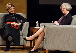 President Shirley M. Tilghman and Anne-Marie Slaughter ’80 sit and talk on a stage.
