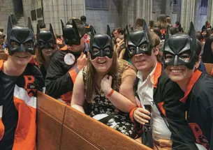C-ClassDay6274altnN.jpg Seniors donned Batman masks for Class Day.