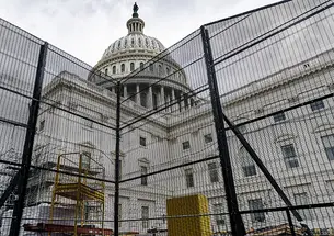 Metal barricades surround the West Front of the Capitol building in Washington during an extensive repair, maintenance, and preservation project on July 29.