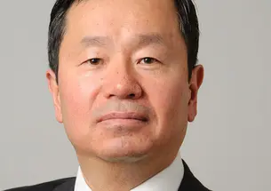 This is a headshot photo of Mun Choi *92.