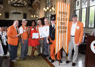 Class of '67 poses with trophy