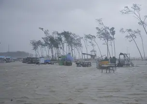 This is an AP photo of beach vendors’ kiosks surrounded by water during high tide at the Digha beach on the Bay of Bengal coast as Cyclone Yaas intensified on May 26, 2021.