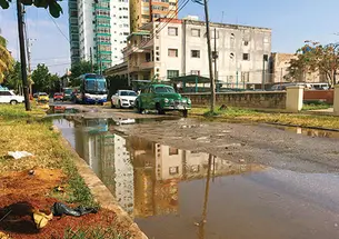 The Vedado neighborhood of Havana after a thunderstorm. Poor drainage often left streets flooded.