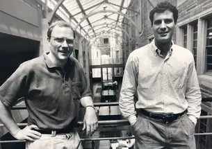 Photo of David Card *83, left, and Alan Krueger