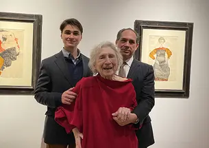 Timothy Reif ’80 *85 with his son, Paul Reif, and his mother, Rita Reif, photographed at Christie’s in New York in December with the two paintings that were the subject of Reif v. Nagy.