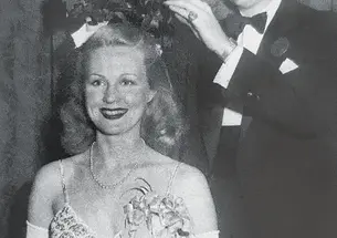 Actress Virginia Mayo is crowned by class president J. Lewis Kirby Jr. ’46