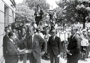 Katzenbach, then deputy attorney general, meets Alabama Gov. George Wallace at the door of the University of Alabama’s Foster Auditorium in this iconic photograph from June 11, 1963. Wallace was trying to prevent two black students from enrolling; he st