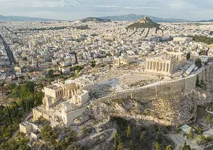 Aerial panoramic view from a drone of the Acropolis of Athens, a rocky outcrop above the city of Athens with many remains of several ancient buildings, the most famous of them is the Parthenon Temple a citadel with Classical architecture.