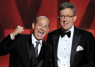 Howard Gordon ’84, left, and Alex Gansa ’84 accept the Emmy for outstanding writing for a drama series for Homeland last year in Los Angeles.