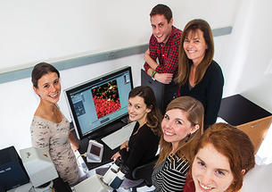 Professor Elizabeth Gould, top right, with members of her lab, from left, Lyra Olson ’16, Maya Opendak GS, Adam Brockett GS, postdoc Elise Cope, and Lily Offit ’15.