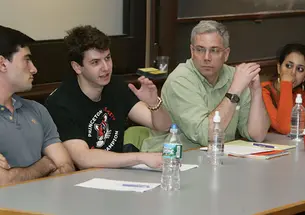 Members of the Freshmen Rush Policy Implementation Committee spoke with students attending an April 2 forum. From left are Arda Bozyigit ’12, Jake Nebel ’13, Professor William A. Gleason, and Shreya Murthy ’13.
