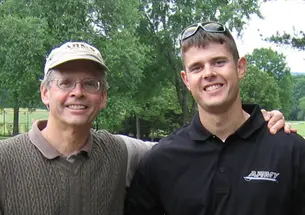 Mark Larsen '76, left, with his son, Christopher. 