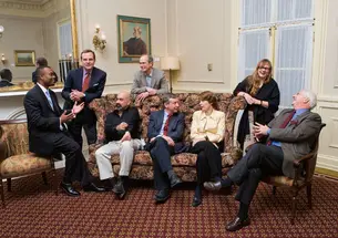 The panelists: from left, Eddie S. Glaude Jr. *97, Todd Purdum ’82, David Spergel ’82, William Russel (standing), Sean Wilentz, Elizabeth Bogan, Emily Thompson *92, and Michael Wood.