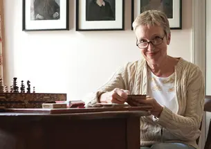 Sherry Lefevre ’74 in her summer house on Nantucket that she furnished with items she found trolling eBay.