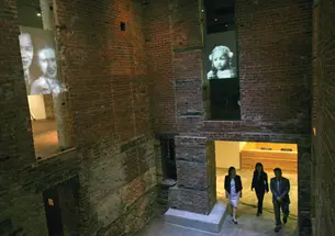 Charles Lai ’78, below, co-founded and until recently was executive director of the Museum of Chinese in America, which celebrated its move and renovation Sept. 22. Above, the museum’s atrium, which represents a traditional Chinese courtyard.