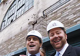  Chris Buccini ’94, left, and Bill Taylor ’95 at the Queen Theater groundbreaking Oct. 2.