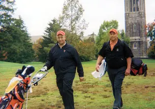 Burton Smith ’77, left, and Rick Hyde ’75, who broke the Ivy League’s color barrier in golf, returned to Springdale last fall.