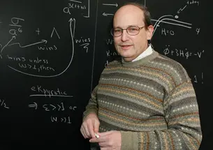 Physics professor Paul Steinhardt with equations describing what happened just before the Big Bang if his theory of a “cyclic” universe is correct.