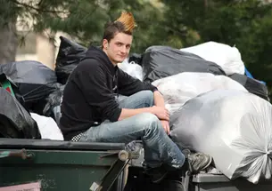 Alex Barnard ’09 takes a hands-on approach to studying a group that is “exposing our society to how wasteful it is.”