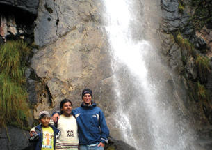 Brian Reilly ’14, far right, at a waterfall in Peru.