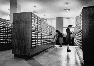 Drawer fronts from the card catalog will become part of an exhibit in the library lobby. The card will be recycled.