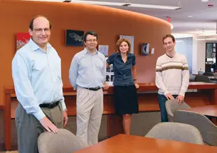 In the new home of the Center for Theoretical Science are, from left, center director Paul Steinhardt, associate director Igor Klebanov *86, and postdocs Aleksandra Walczak and Thomas Klose.