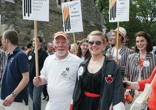 Douglas Bailey *72 and his daughter Kat ’10 march in the 2010 P-rade. A new report says that campus events held at times other than Reunions may be more appealing to graduate alumni.