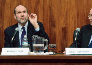 Stephen Walt, left, makes a point in Dodds Auditorium as co-author John Mearsheimer looks on during a heated discussion of the pair's controversial book on the "Israel lobby."