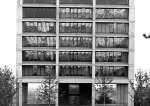 An early photo of New South, taken before the first floor was enclosed in 1982. The building will become home to the creative writing program and studio spaces for dance and theater.